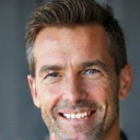 Smiling man, David L., mid-40s, looking confident and healthy